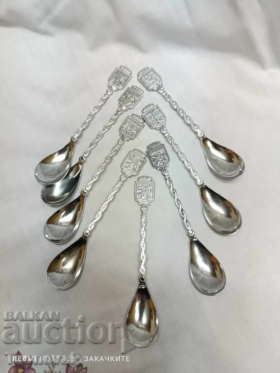 Eight collectible spoons Eight collectible spoons
