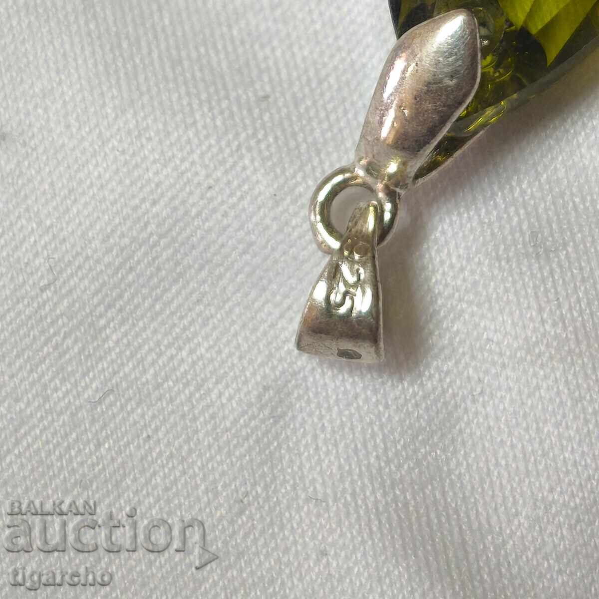 Auction Silver pendant with a stone Auction Silver pendant with a stone