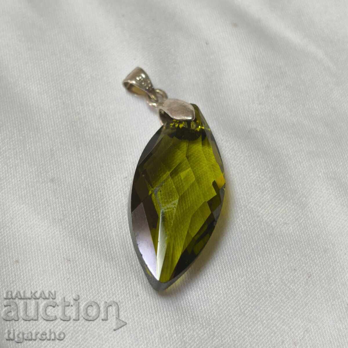 Silver pendant with a stone Silver pendant with a stone