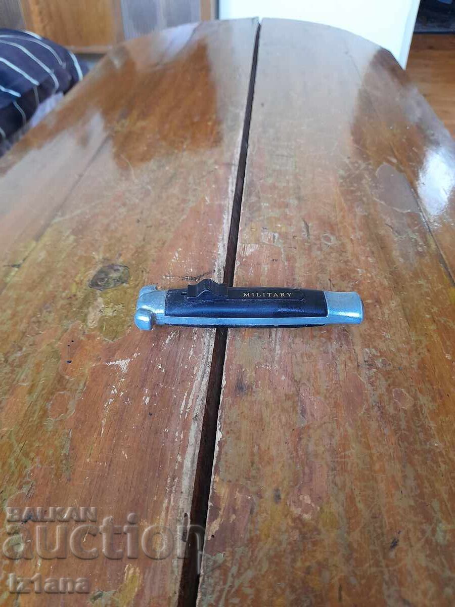 Cuțit automat vechi