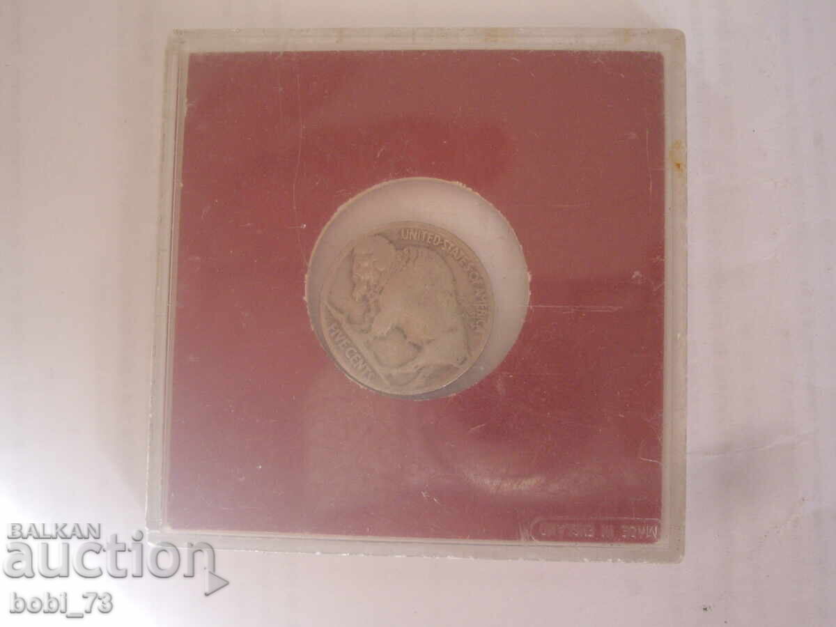 Srebyrna stara moneta.