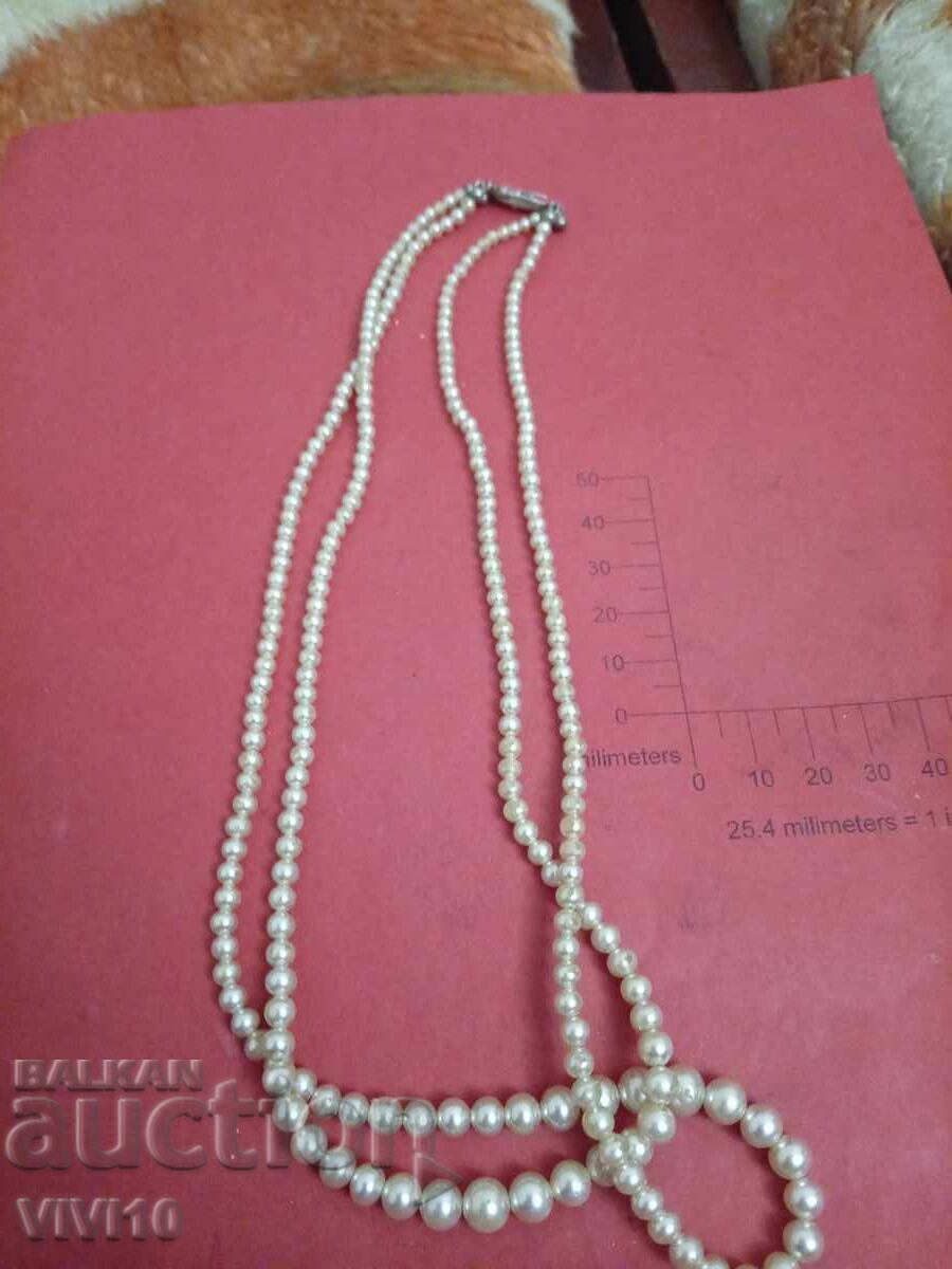 Antique pearl necklace with a silver clasp