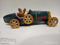 Mașină veche de tablă cu mecanism de frecare cu înfășurare