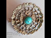 Broșă de argint, artă militară