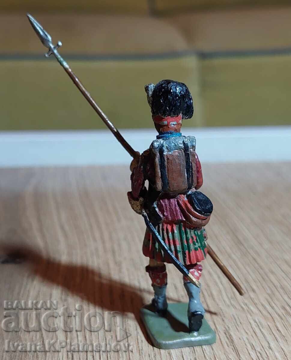 Livrarea O figurină de plumb pentru colecționari