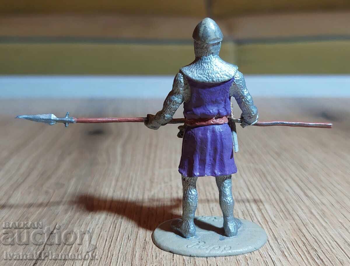 Livrarea O figurină de plumb pentru colecționari