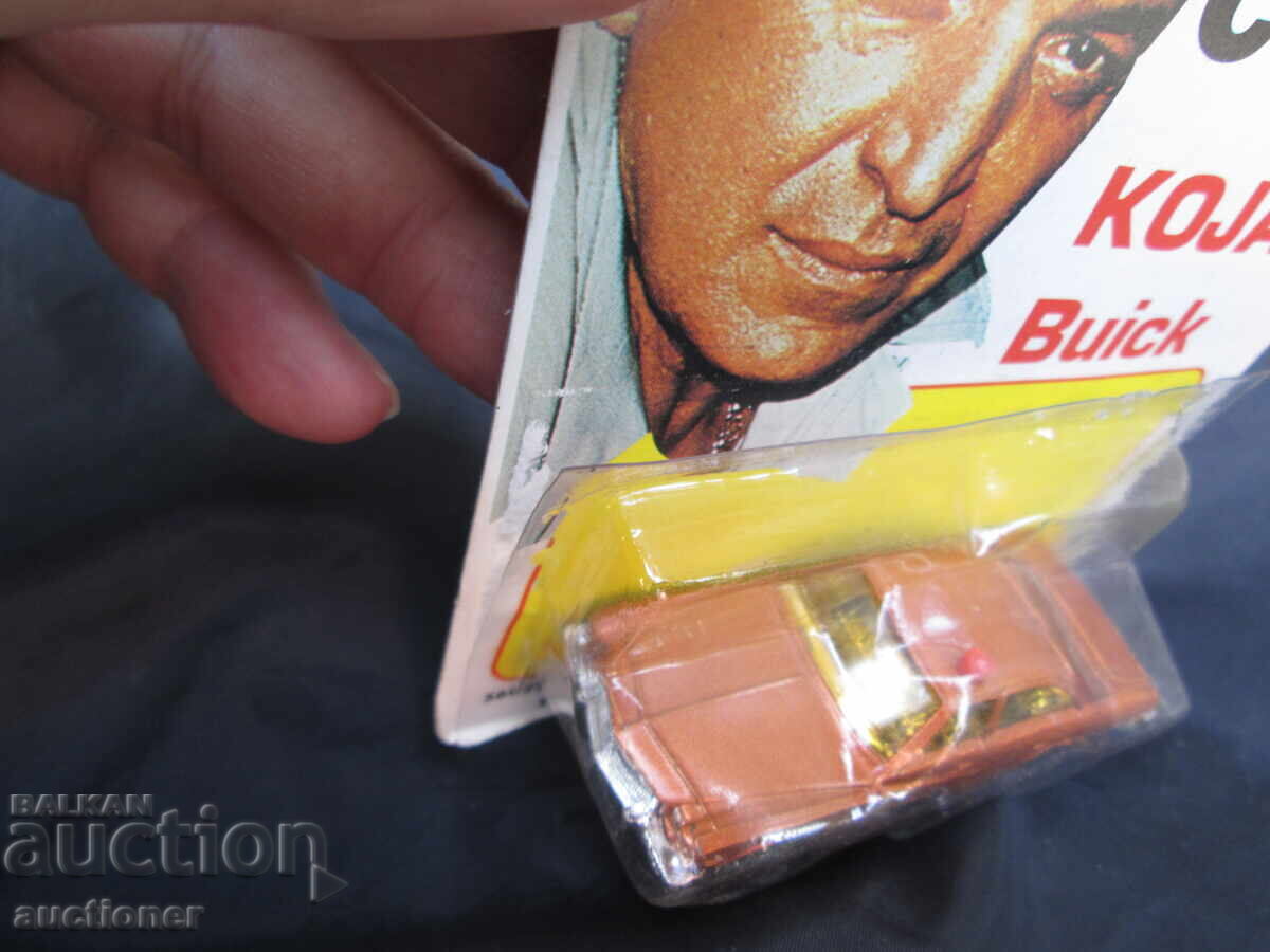 Auction  VINTAGE CORGI KOJAK BUICK, SEALED UNOPENED - 1977