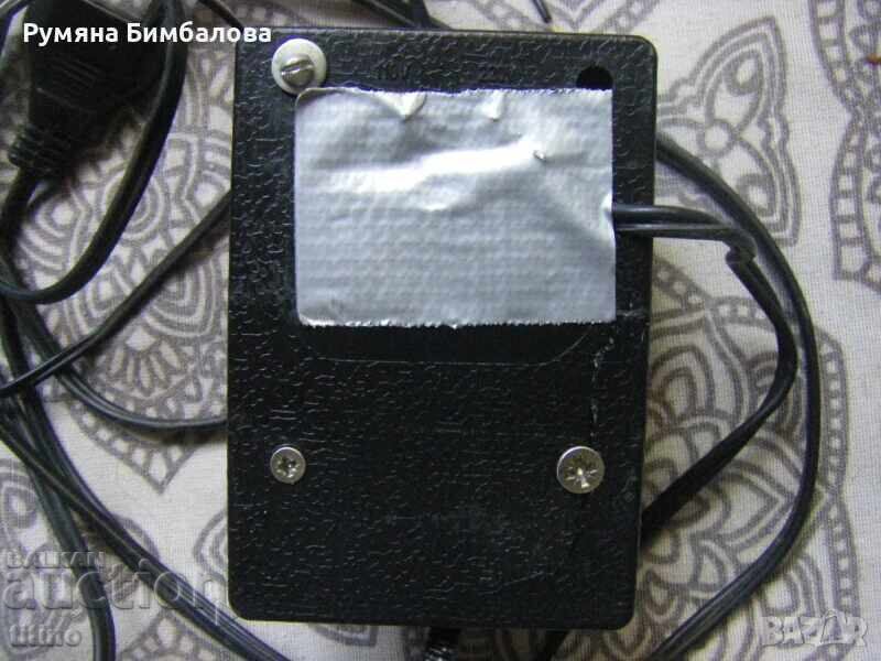 Работещ адаптор/токоизправител АС 220V/DC 1.5V-12V,1200mA с цена 5.00 лв. | € 2.56