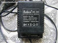 Adaptor/redresor AC 220V/DC 1.5V-12V, 1200mA funcțional