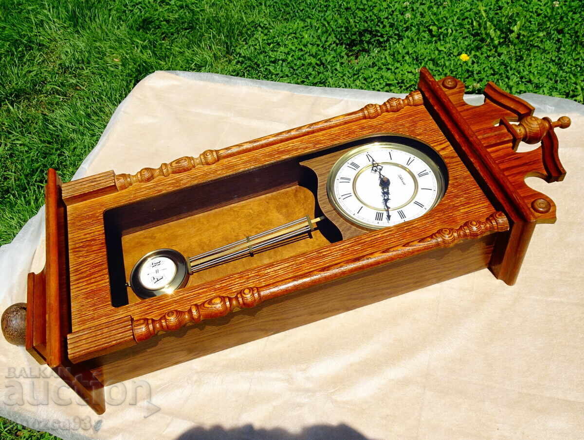 German wall clock with pendulum, gongs