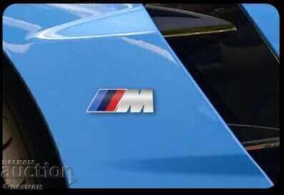 Licitație Embleme noi "M" pentru "BMW" - 73 mm./27 mm Licitație Embleme noi "M" pentru "BMW" - 73 mm./27 mm