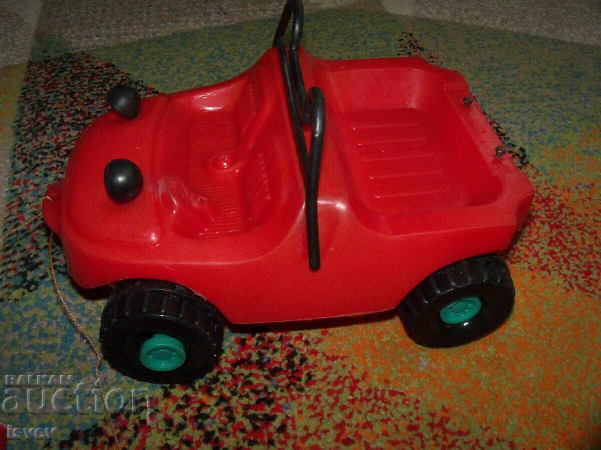 Аукцион Голяма соц пластмасова кола играчка за дърпане