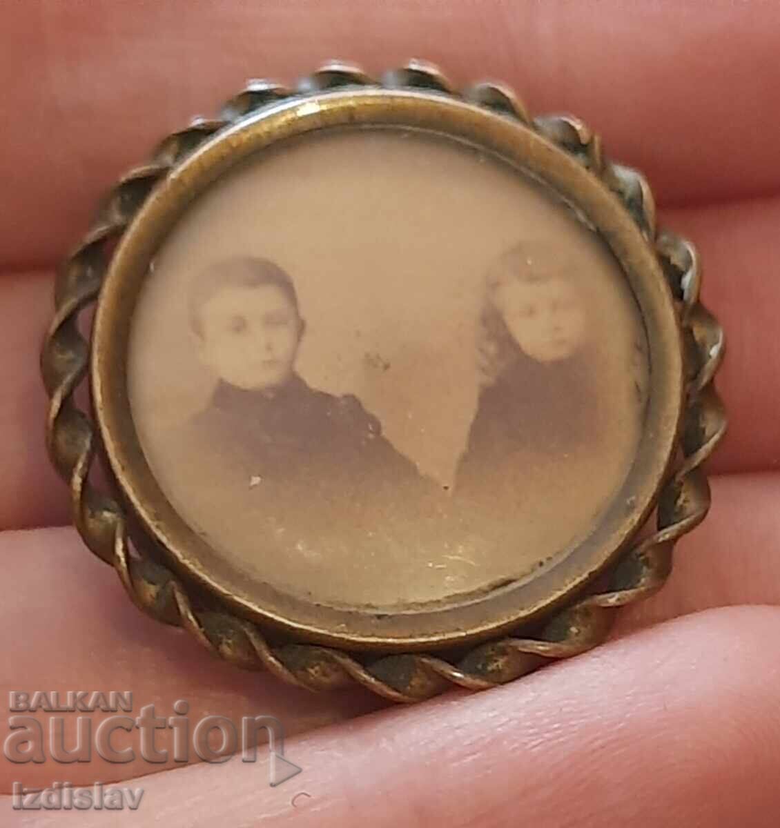 Antique brooch with a photo