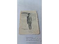 Снимка Момче на брега на морето