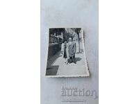 Φωτογραφία Σοφία Άνδρας και γυναίκα στο πεζοδρόμιο