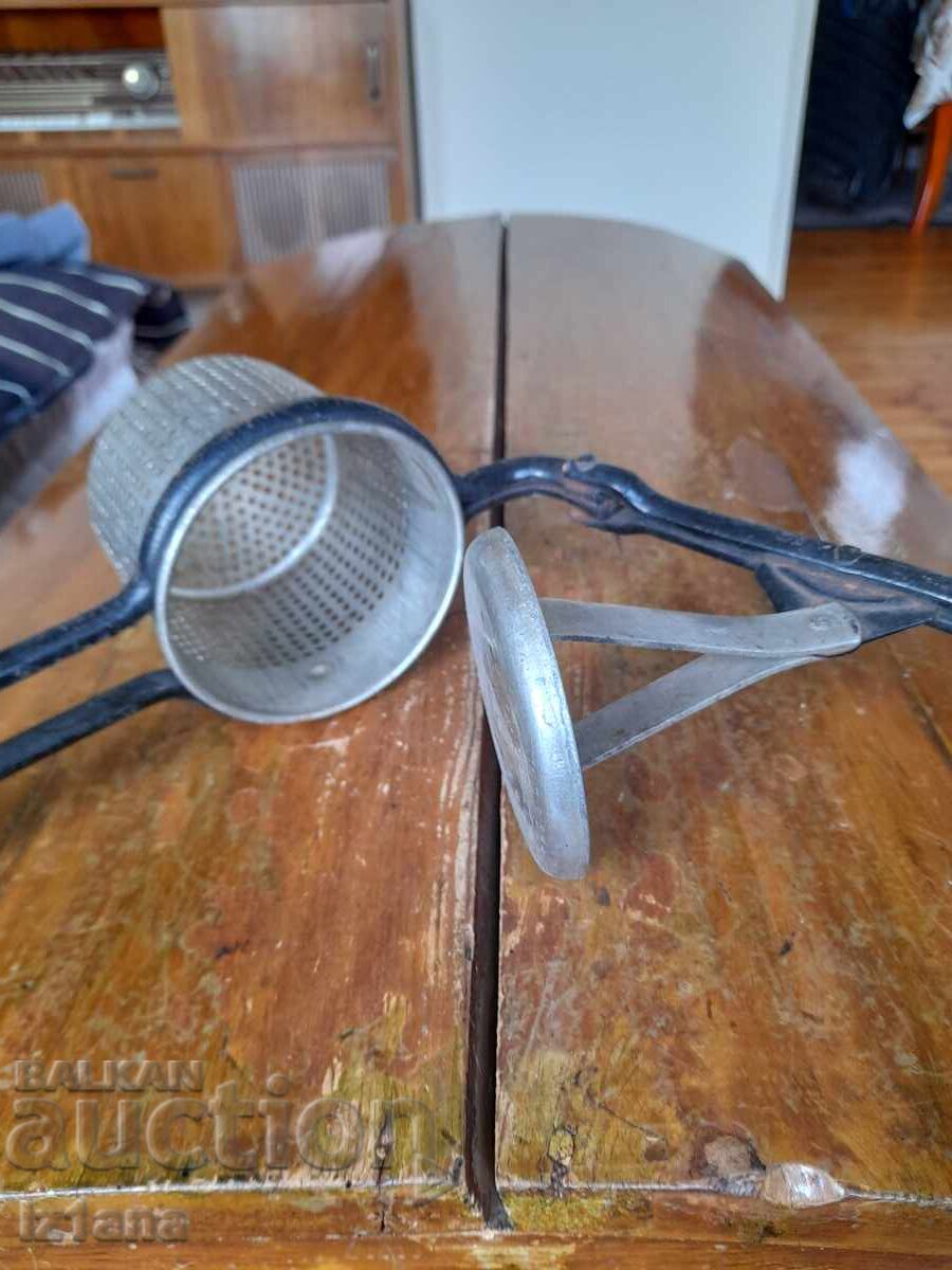 Auction Old potato press Auction Old potato press