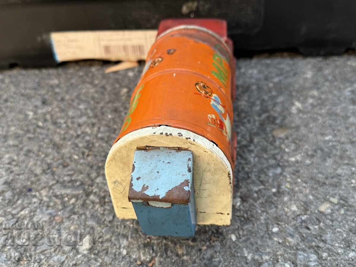 Delivery of Old metal toy model garbage truck