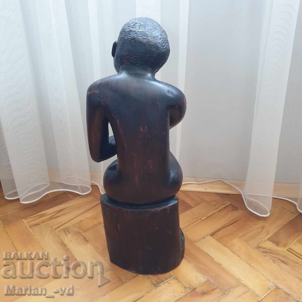 Доставка на Масивна абаносова фигура от цяло дърво