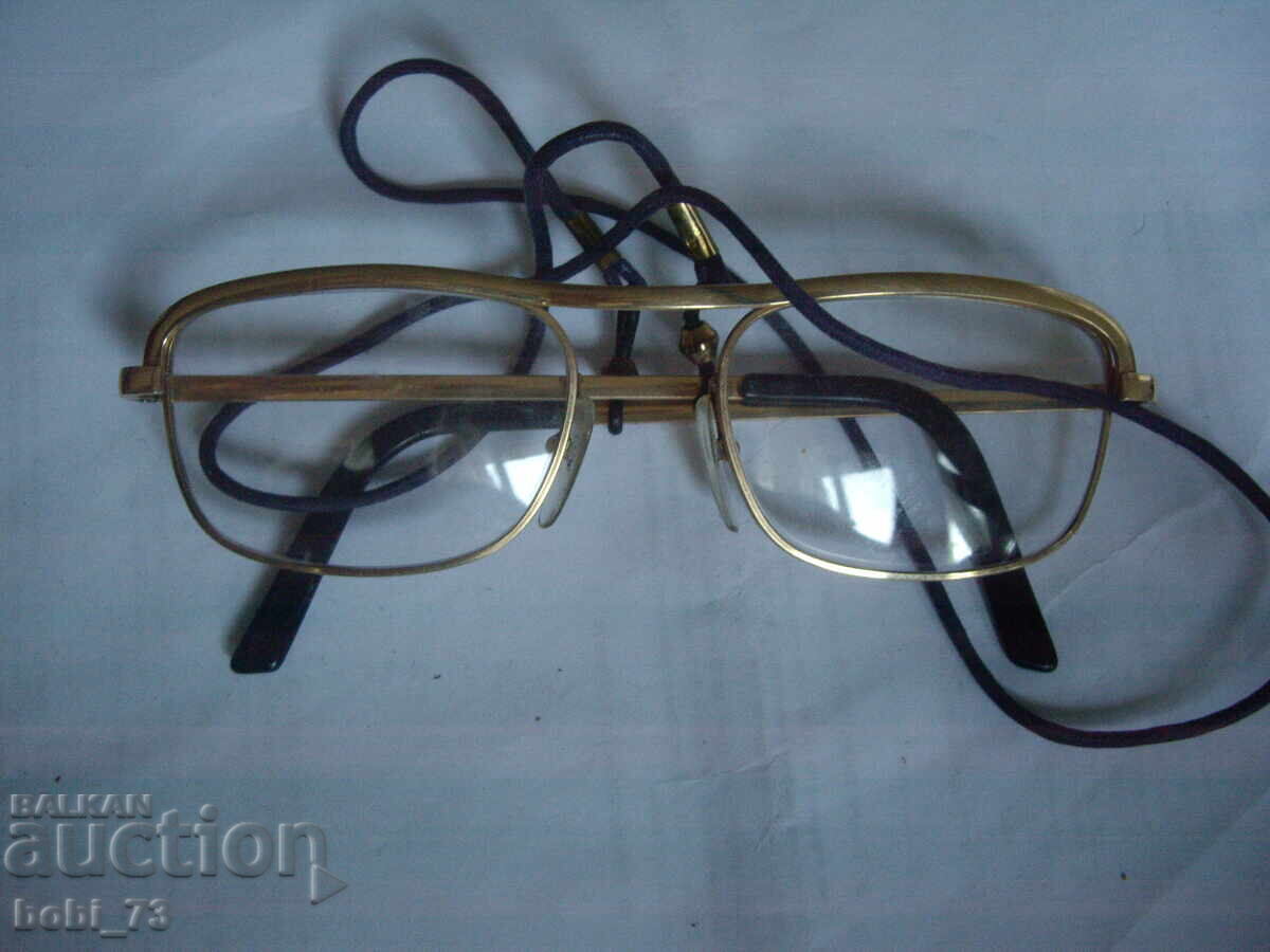 Gold-framed glasses with price 1500.00 BGN | € 766.94