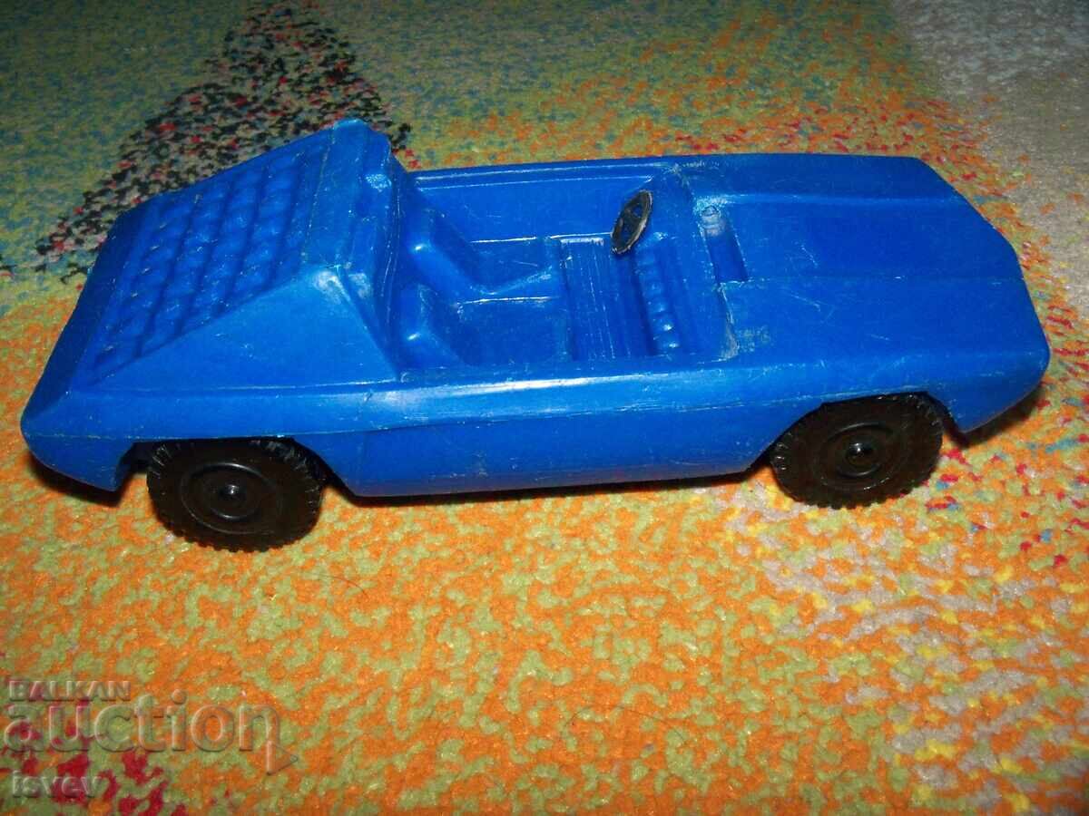 Παράδοση Παλιό πλαστικό καρότσι μπλε, σοσιαλιστικό παιχνίδι