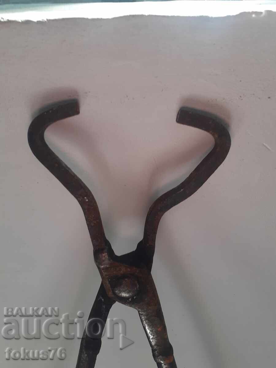 Delivery of Old forged blacksmith tongs with long handles Delivery of Old forged blacksmith tongs with long handles