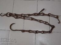 Old wrought iron chain with hook, hearth chain hook chain