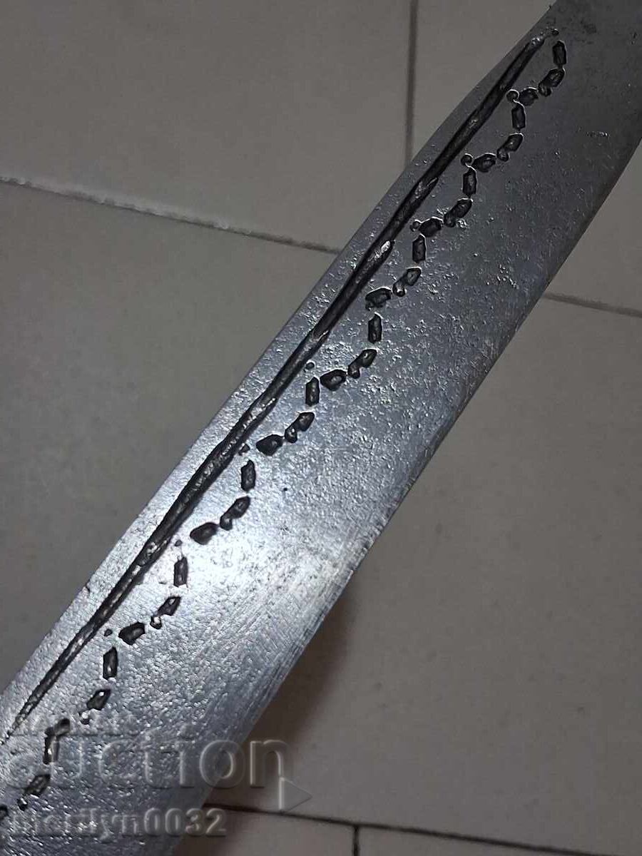 Auction  Hand-forged knife with engravings, horn handle without a sheath (shark-like)