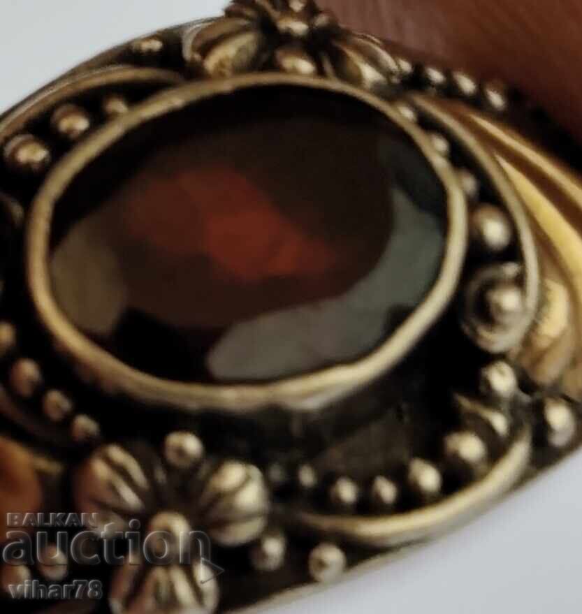 Auction  Silver ring with garnet