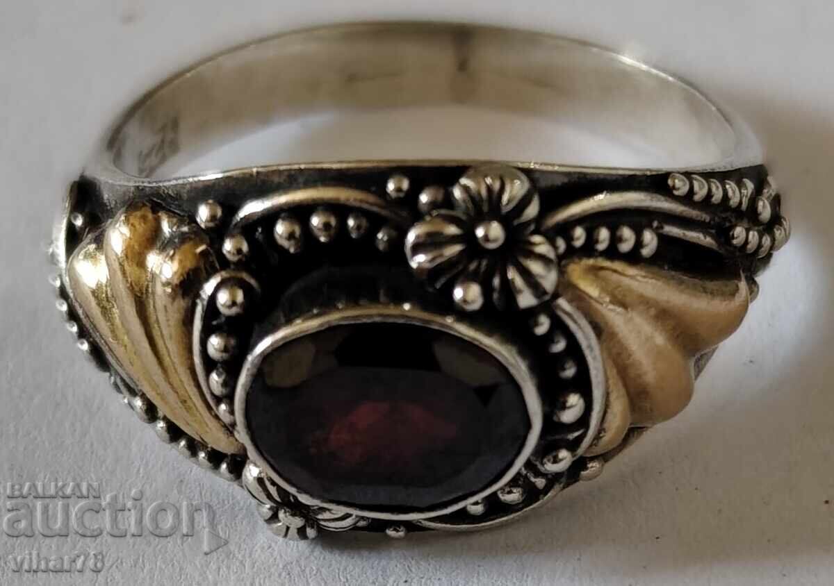 Silver ring with garnet