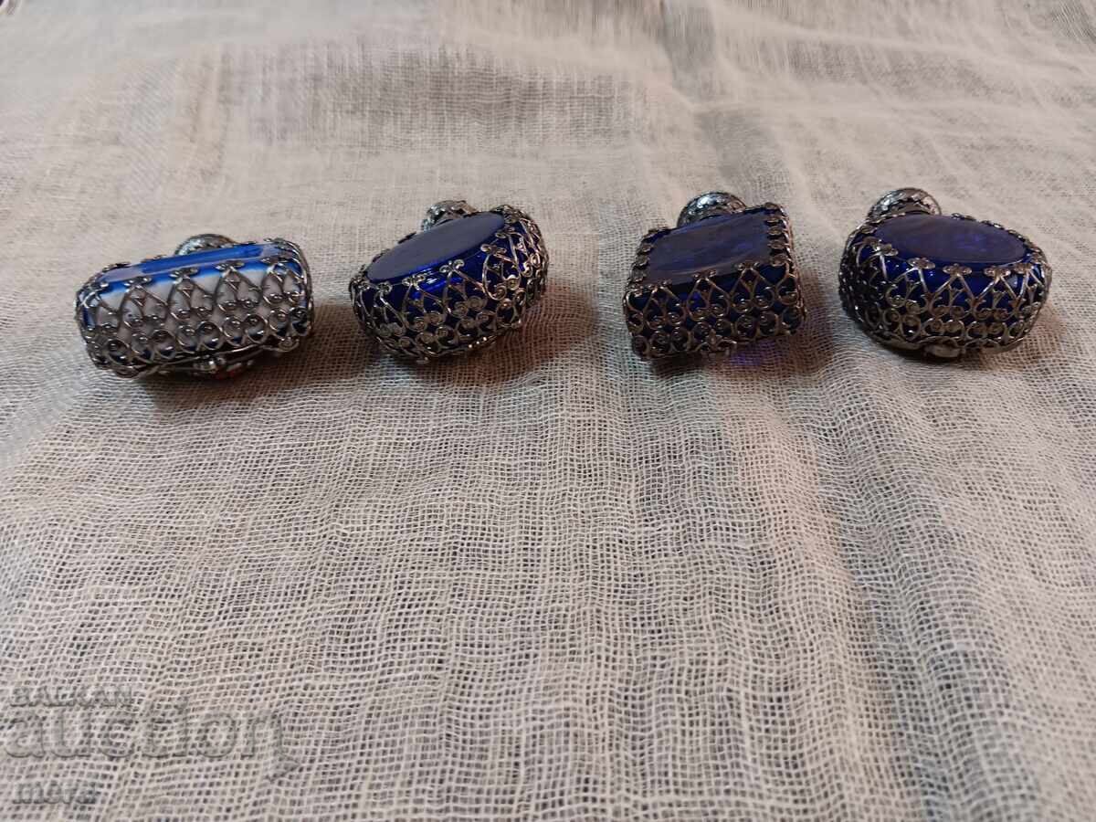 Delivery of Lot of perfume bottles with metal trim and colored stones Delivery of Lot of perfume bottles with metal trim and colored stones