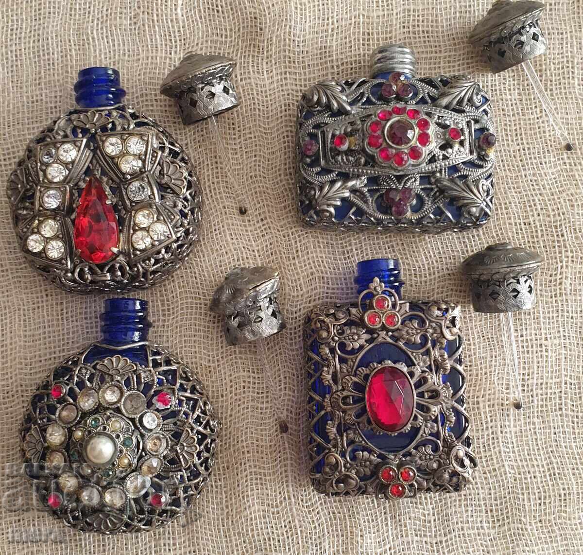 Lot of perfume bottles with metal trim and colored stones - 7 Lot of perfume bottles with metal trim and colored stones - 7