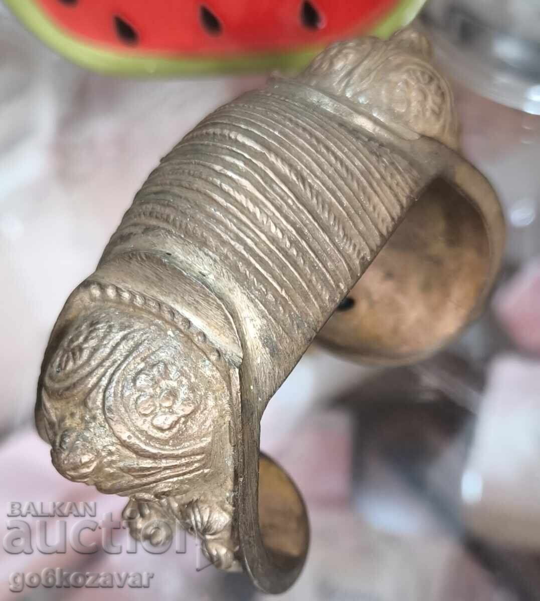 Auction  Revival-era baked clay bracelet, slingshot, ornament, jewelry!