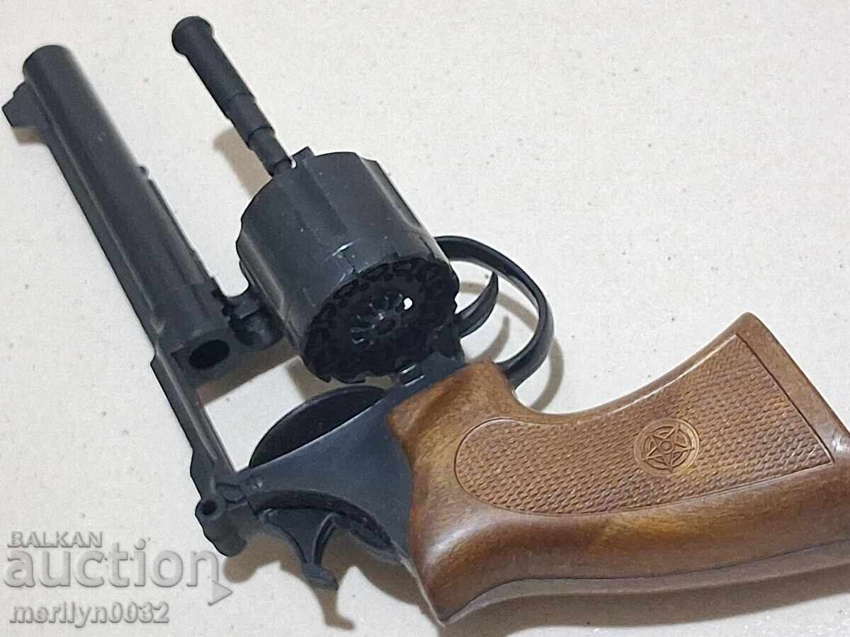 Auction  Children's toy revolver, cap gun, small pistol works