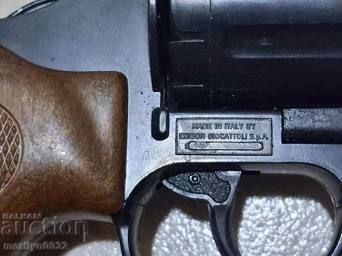 Delivery of Children's toy revolver, cap gun, small pistol works