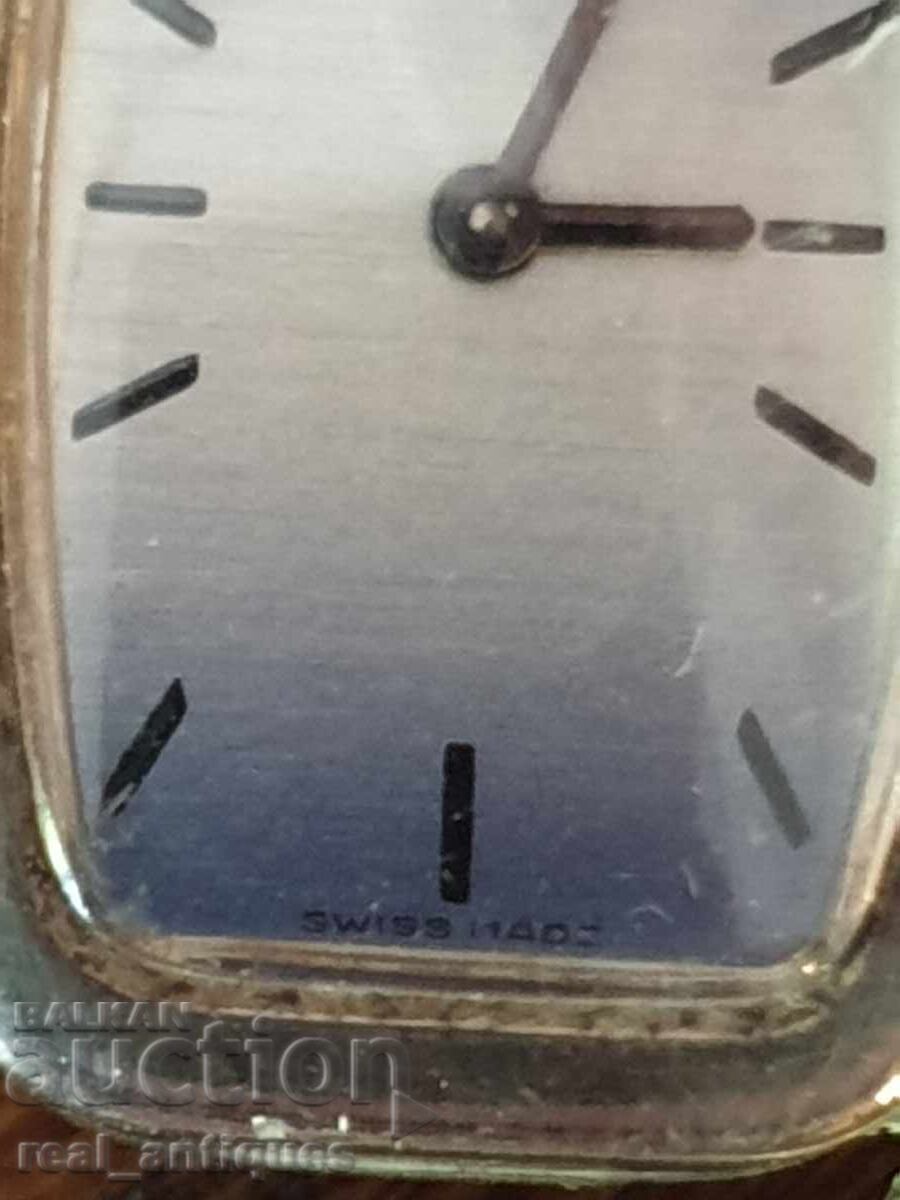 Auction  A silver watch