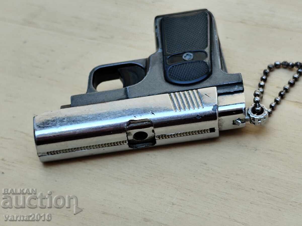 Delivery of Gun-shaped lighter - LAMP LIGHTER