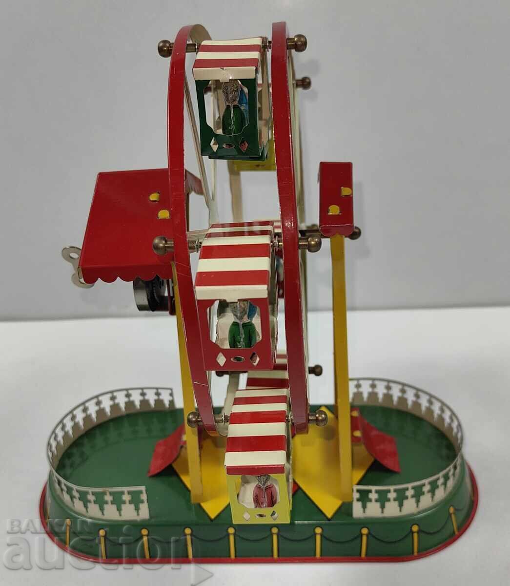 Auction  VIENNESE WHEEL WITH KEY TOY CHILDREN'S TIN METAL