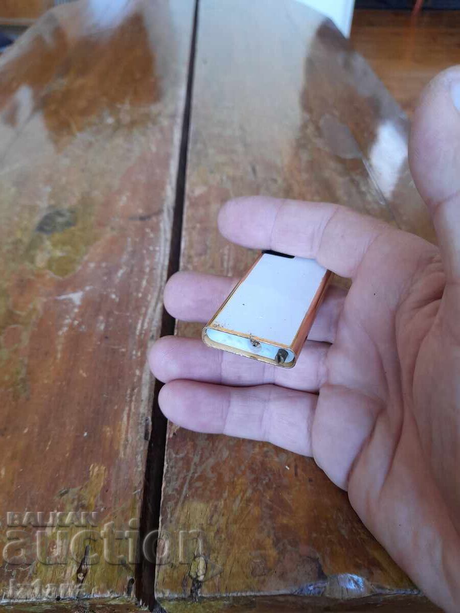 An old Marlboro lighter - 7