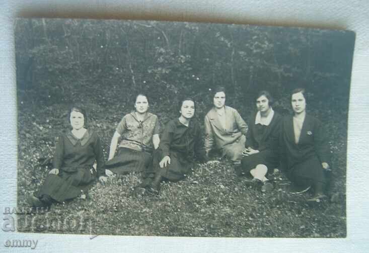 Old photo - young women sitting Old photo - young women sitting