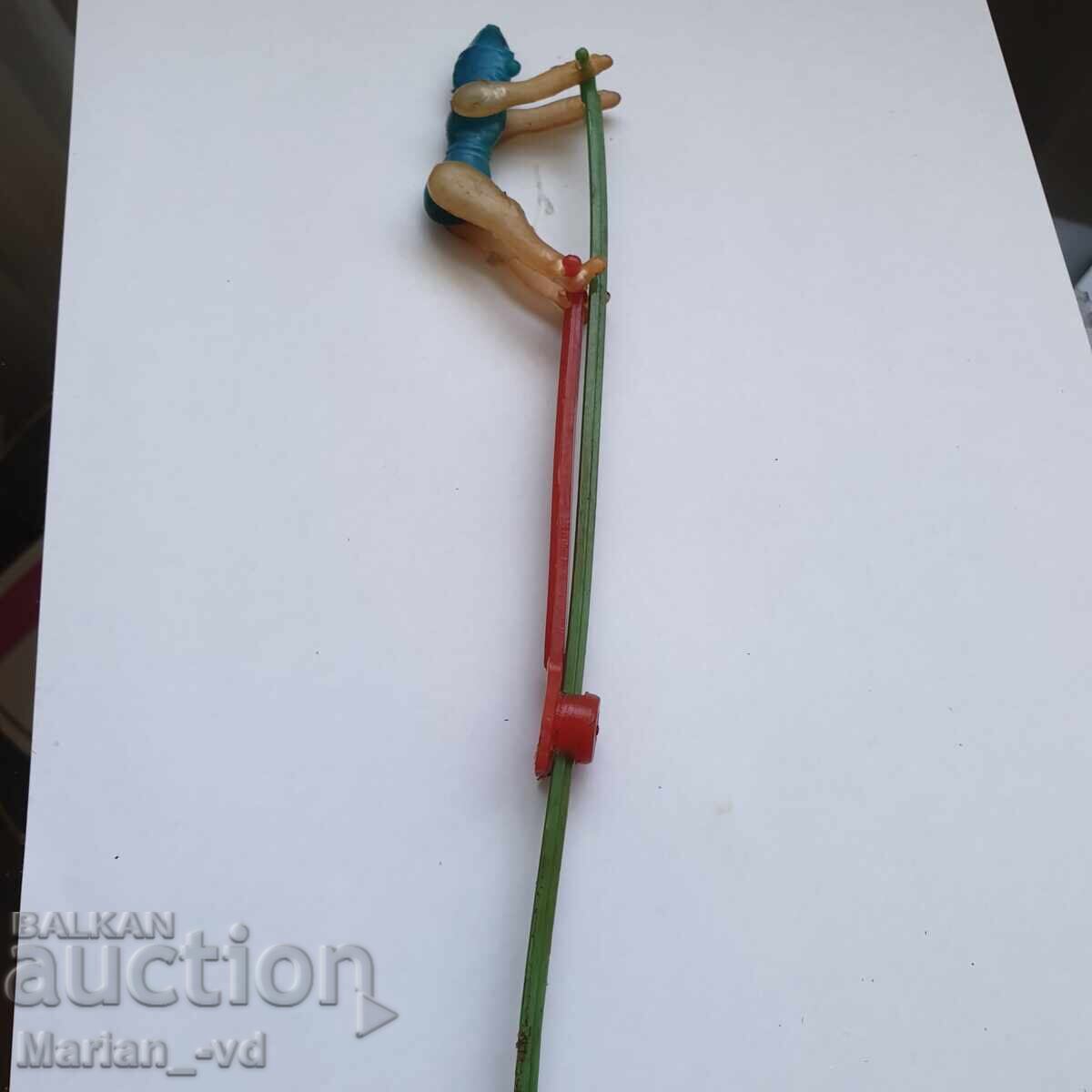 Delivery of Mechanical Plastic Toy from the 80s, Acrobat Stick