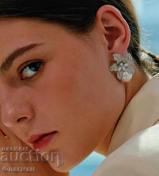 Γυναικεία σκουλαρίκια / 2 με τιμή € 20.00 | 39.12 BGN