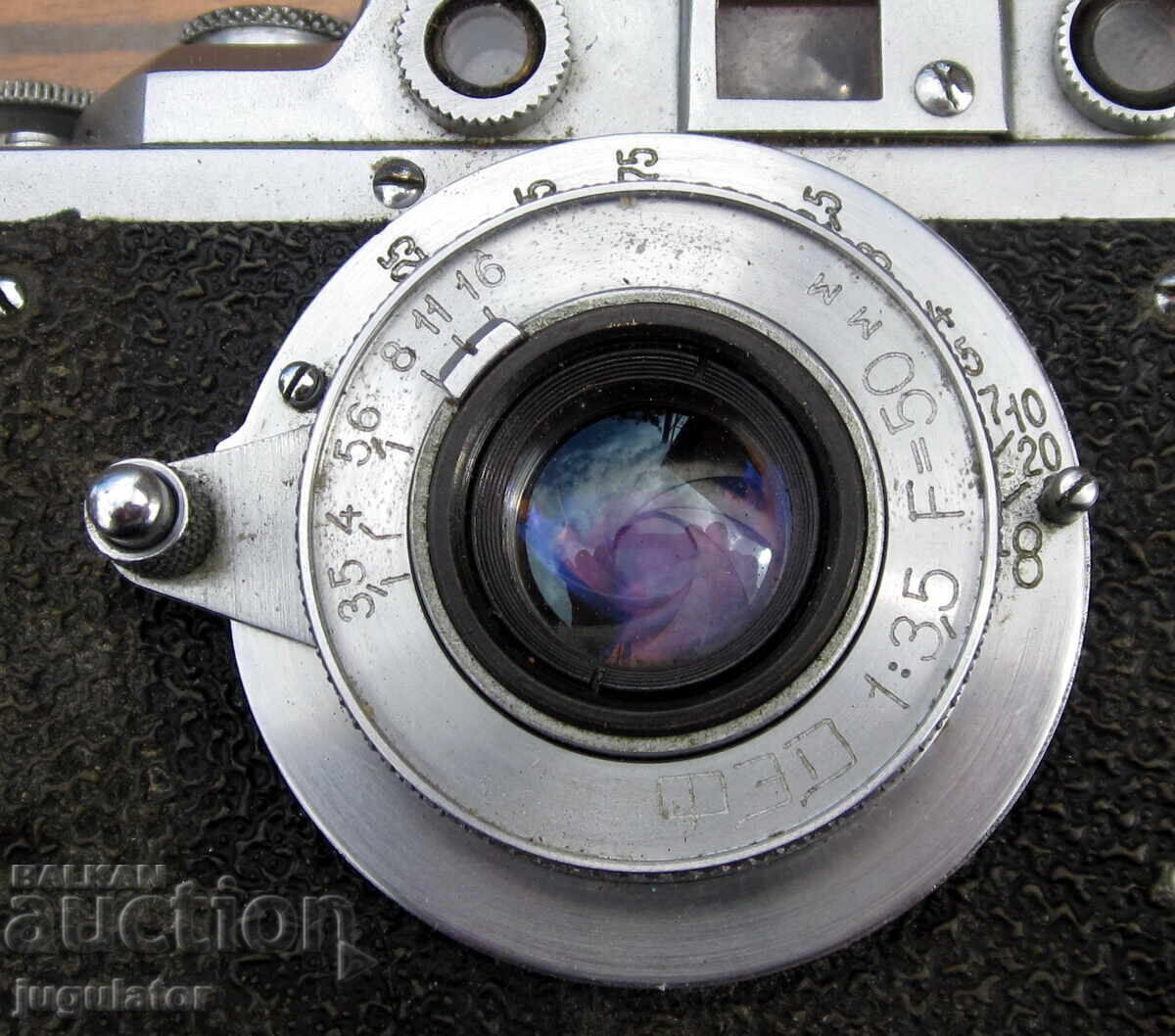 Old Russian FED camera with a collapsing lens and case - 6
