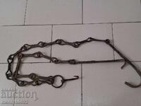 Old wrought iron chain with hook, hearth chain hook chain