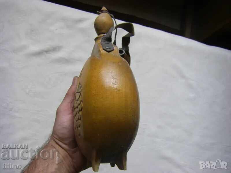 Delivery of Old wooden flask from the 80s