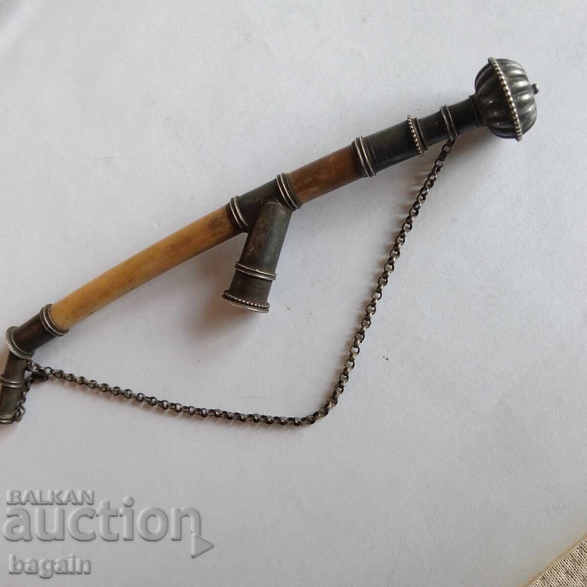 Auction  Unique silver opium pipe