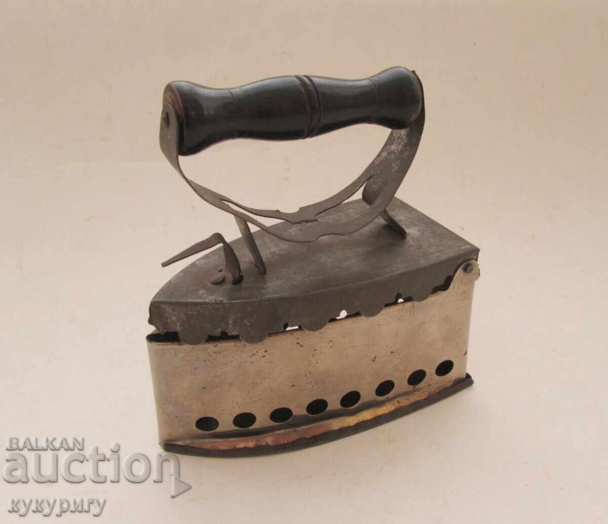 Old small metal coal iron for decoration