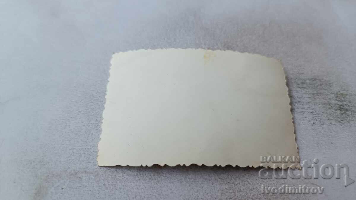 Photo Sofia Young girl in front of TSUM with price 1.75 BGN | € 0.89