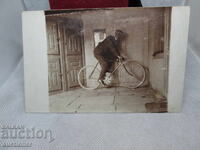 OLD CARD OF A CYCLIST ON A BIKE