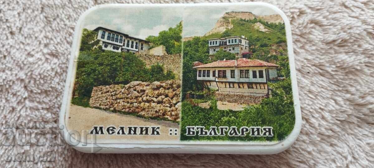 Souvenir with a fridge magnet, made of plastic