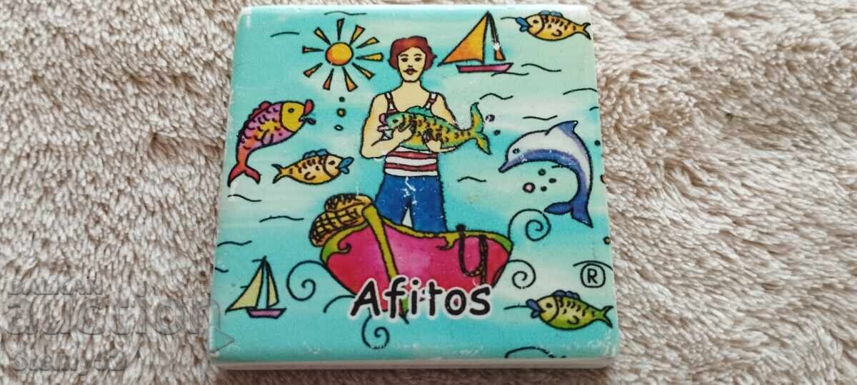 Souvenir with a fridge magnet, made of ceramic